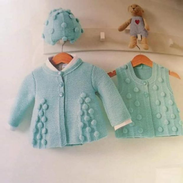 Bon bon şekeri modeli ile örülmüş güzel bir hırka modeli..